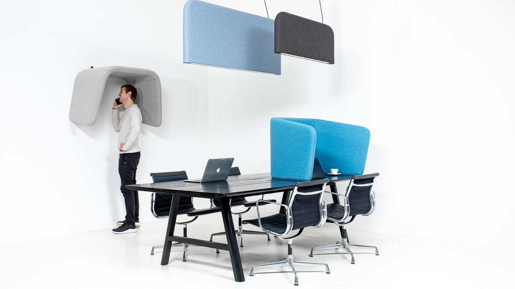 Buzzi Space BuzziCocoon Acoustic Element In Blue In Office Setting With Person