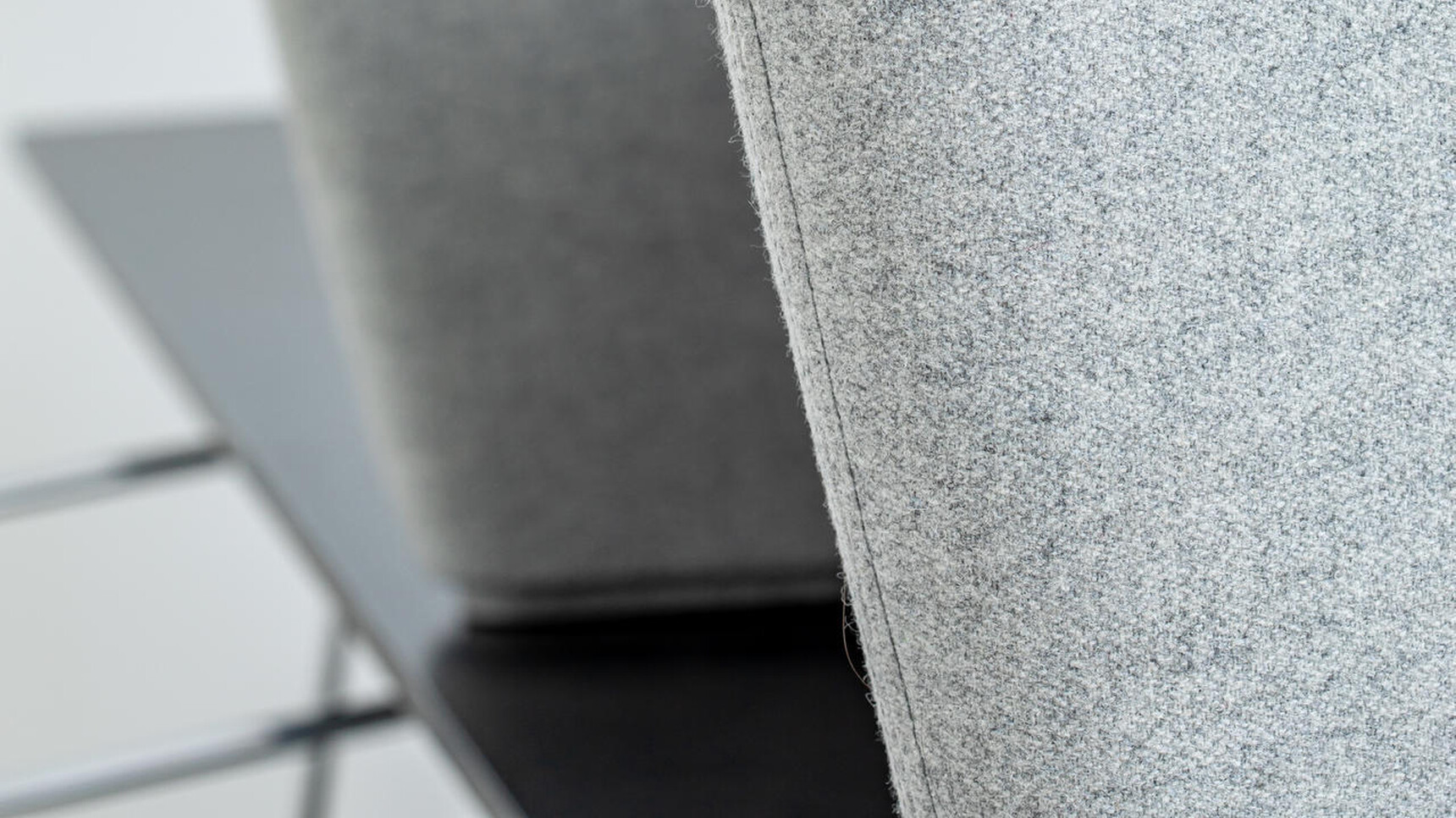 Buzzi Space BuzziCocoon Acoustic Element Grey Detail Image Grey Finish Detail Image Of Element On Table