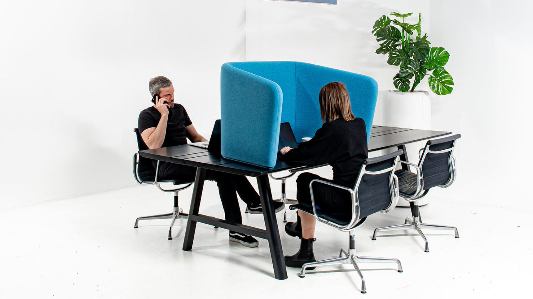 Buzzi Space BuzziCocoon Acoustic Element Blue Finish In Office Setting With Two People