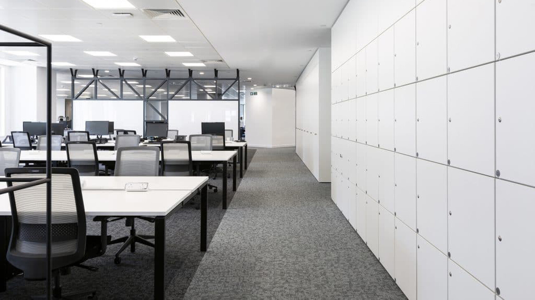 Workstories Rail Office Bench Desk White Top In Office Setting