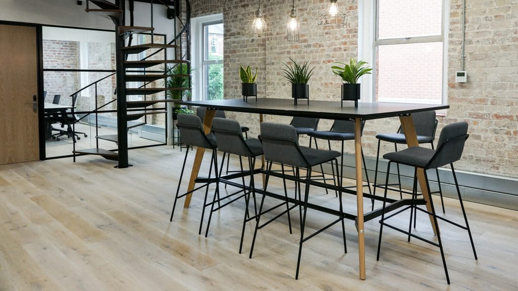 Workstories Hub Poseur Height Table Black Top In Office Setting