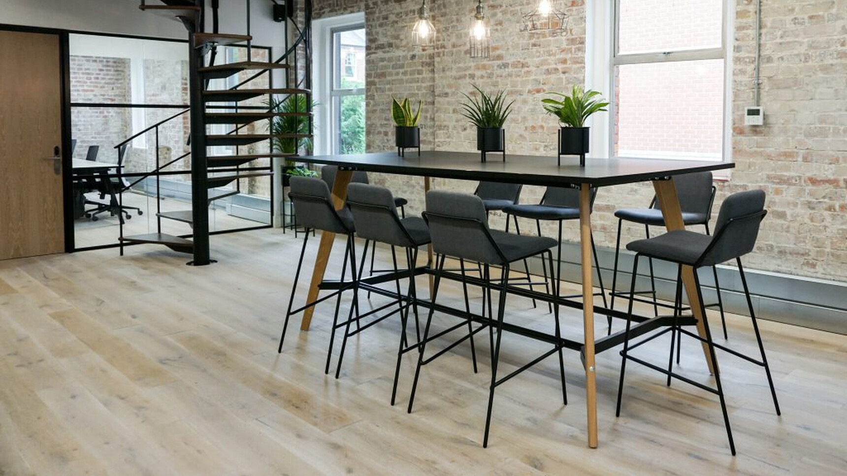 Workstories Sling High Upholstered Stool At Poseur Height Table Black Frame Family Image