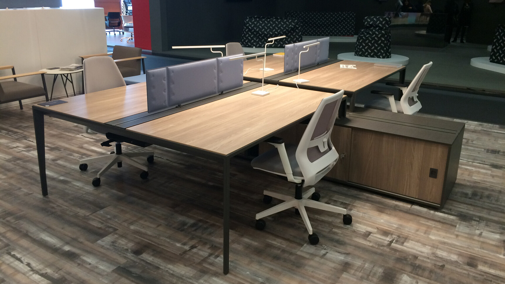 Two Quadrifoglio X5 Two Person Bench Desks 1238mm Depth With Dark Wood Finish And Black Leg Finish With Two Black Table Top Screens And Four Quadrifoglio Chairs At Desk