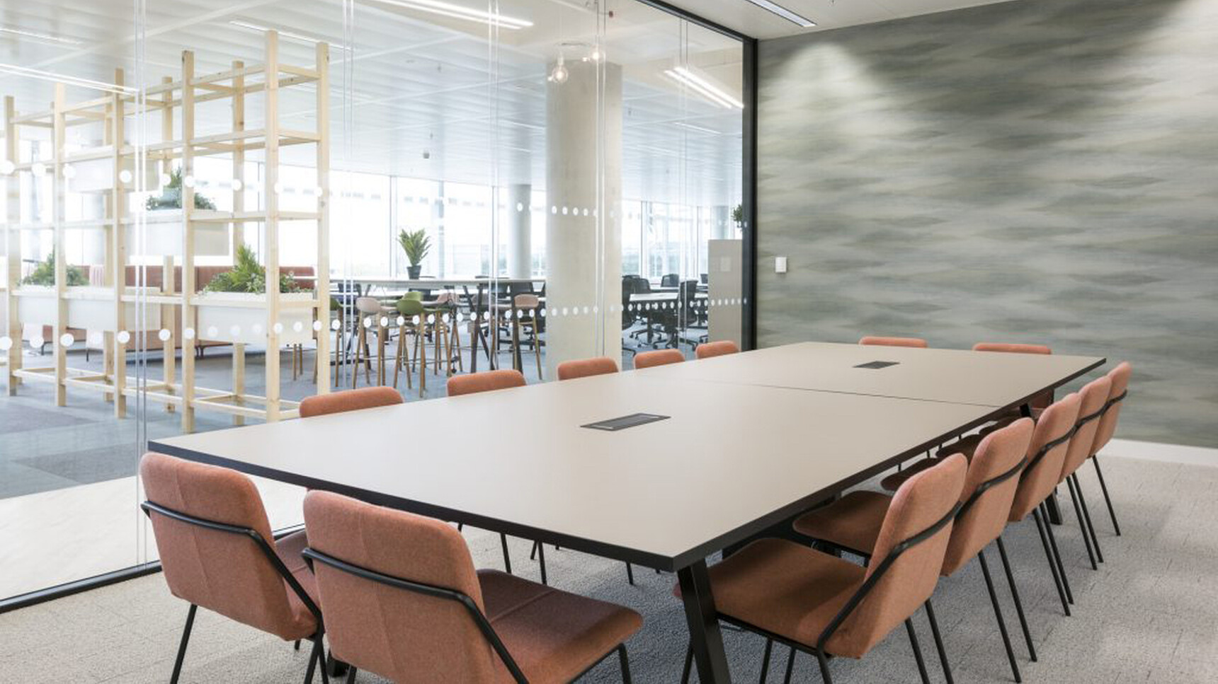 Workstories Sling Upholstered Side Chairs At Table In Office Environment