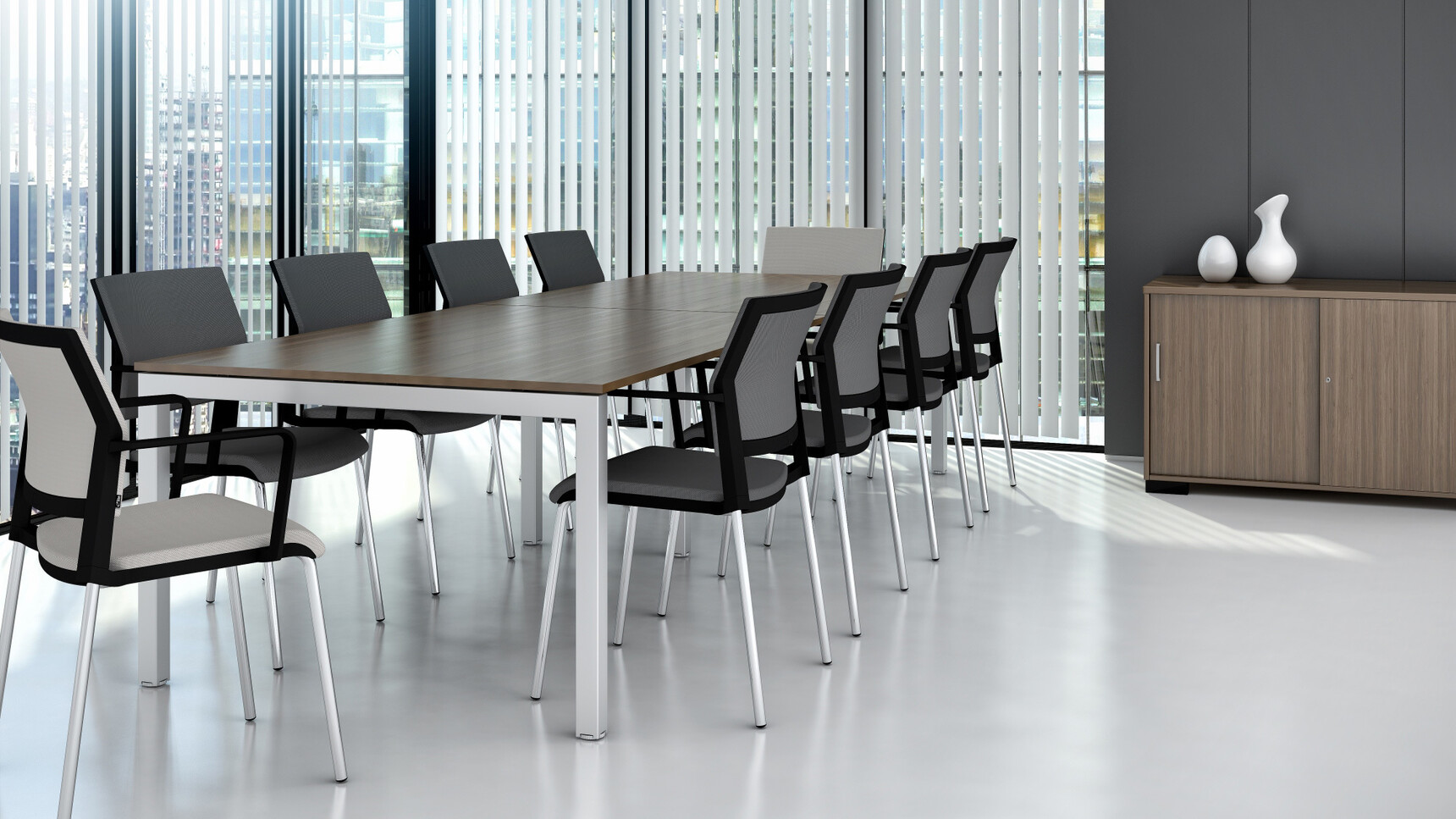 Elite Matrix Conference Table With Dark Wood Finish With Silver Legs With Ten Elite Chairs With Grey Upholstery At Table