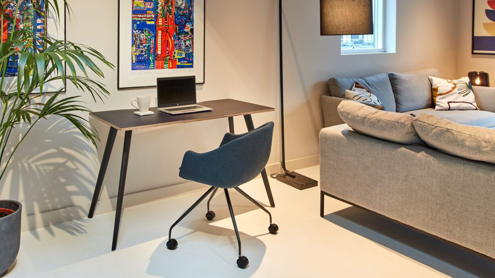 Workstories Noir Tub Executive Meeting Chair 4-Star Castor Base In Home Setting