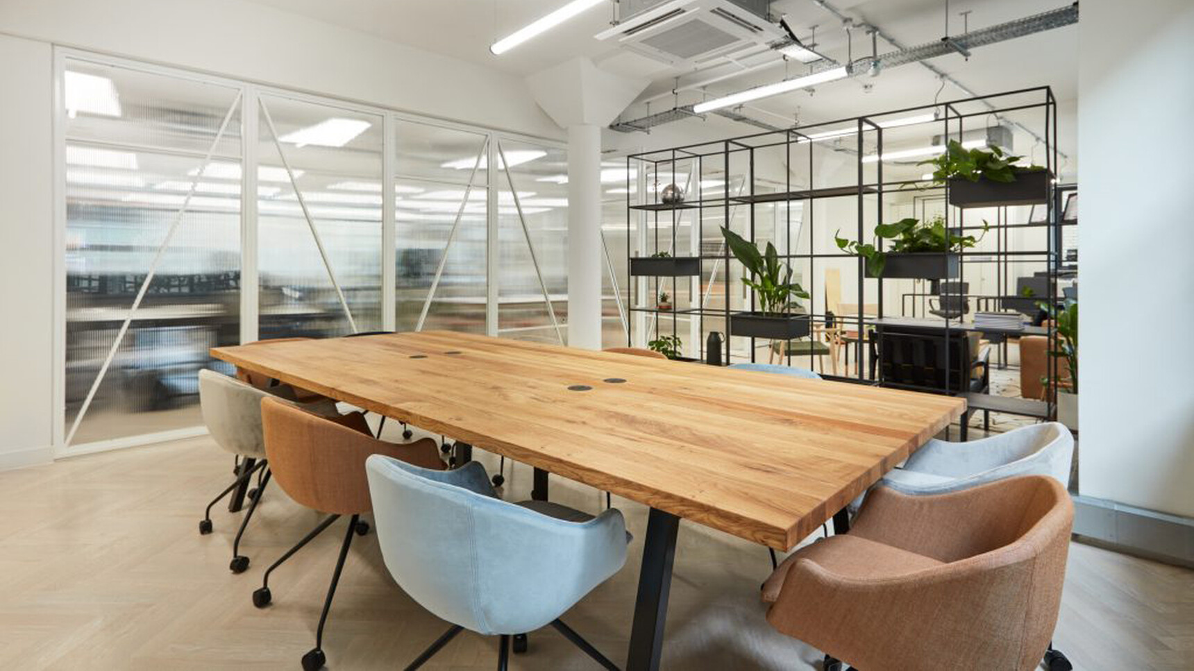 Workstories Noir Tub Executive Meeting Chair 4-Star Castor Base In Office Environment