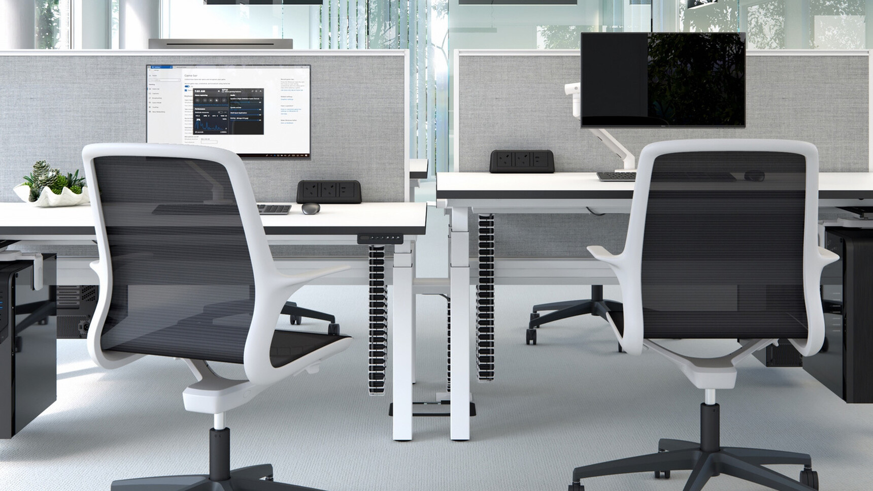 Two Elite Tempo Mesh Five Star Base Office Chairs With White Frame And Black Mesh Back And Black Base On Castors At Height Adjustable Desks