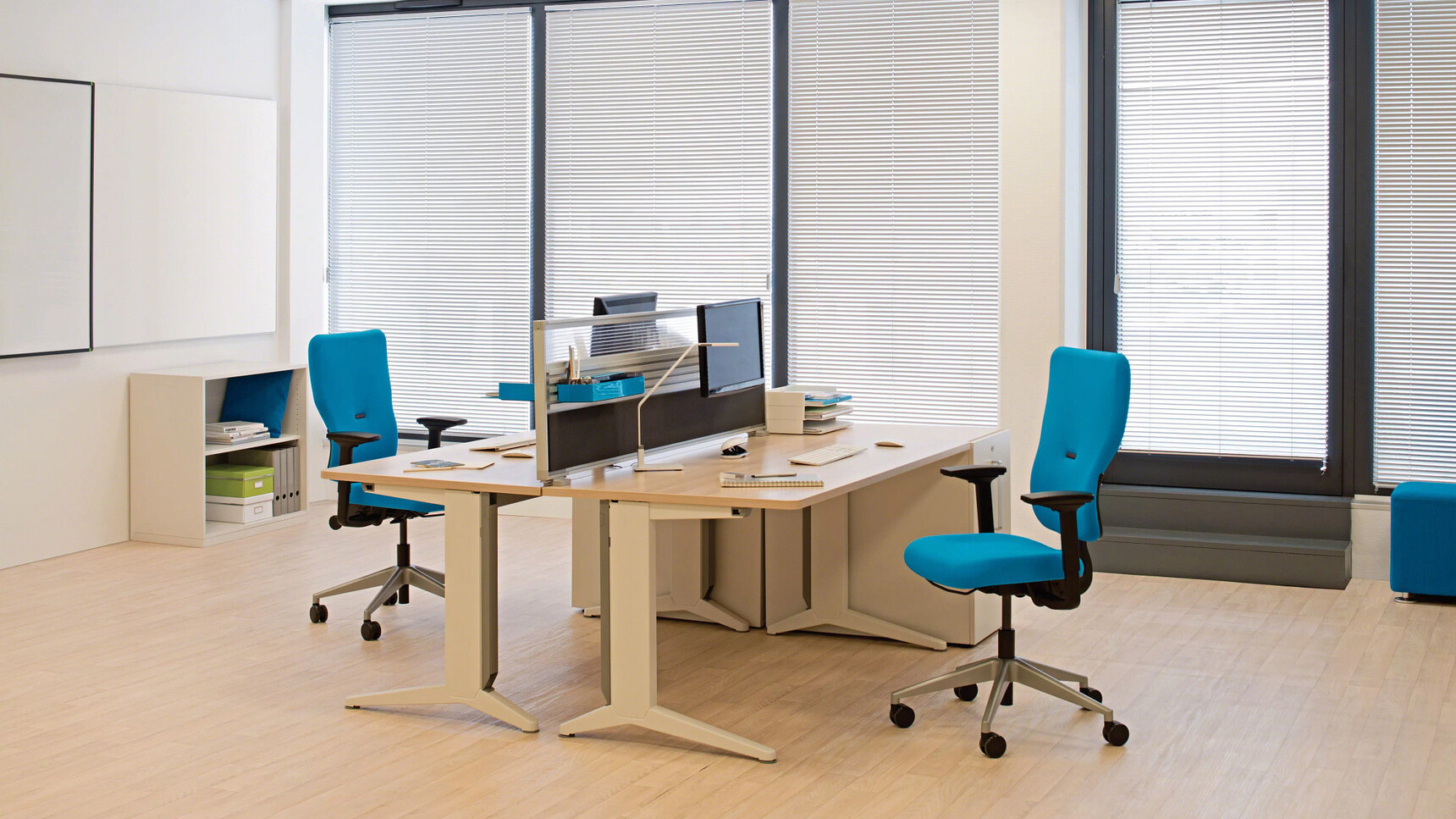 Steelcase Let's B High Back Office Chairs Blue Upholstery At Fixed Height Desk In Office Environment