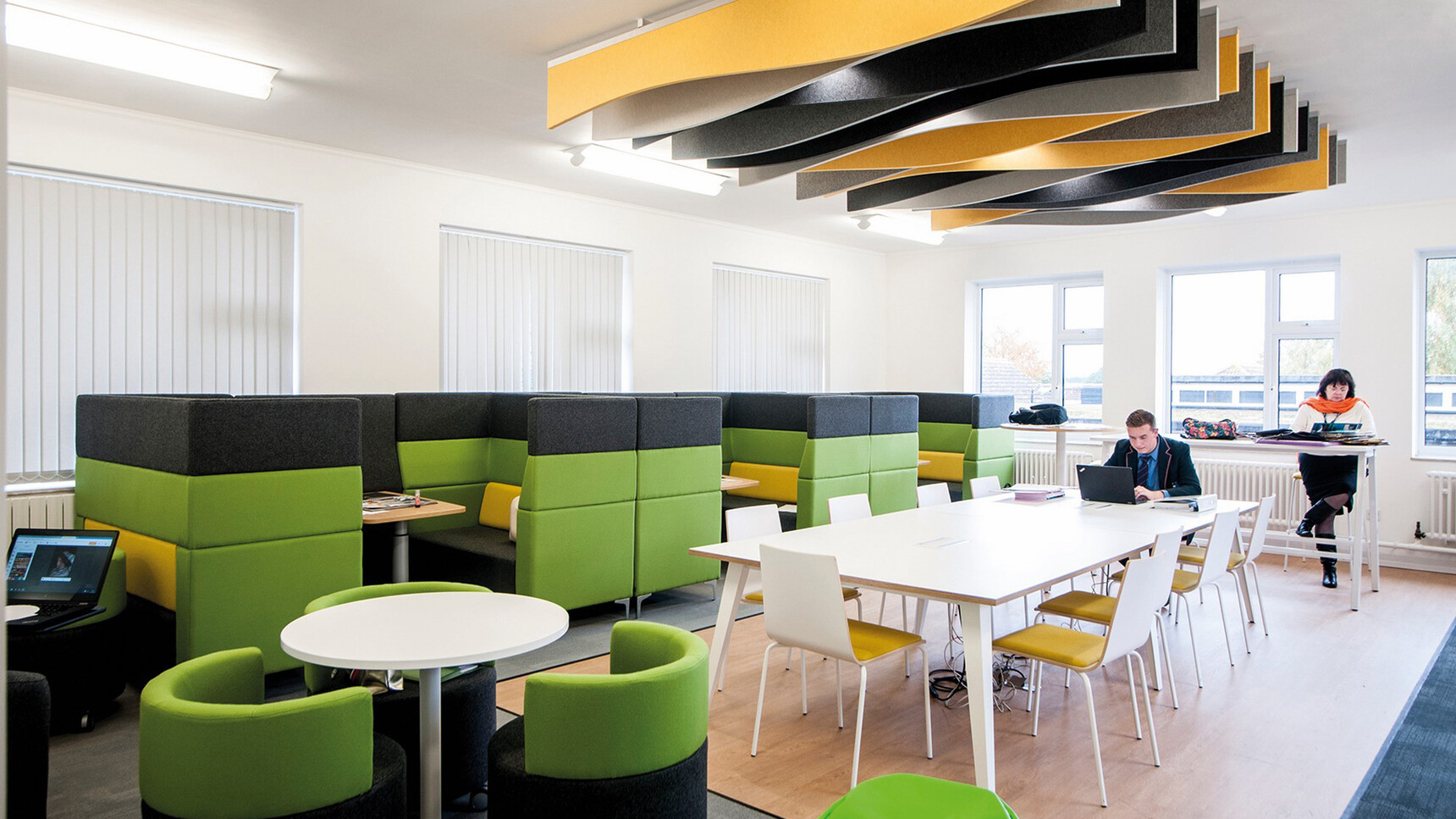 Elite Office Furniture Multiply Meeting Chairs Four Leg Base And Seat Pad Closed Back In Office Setting