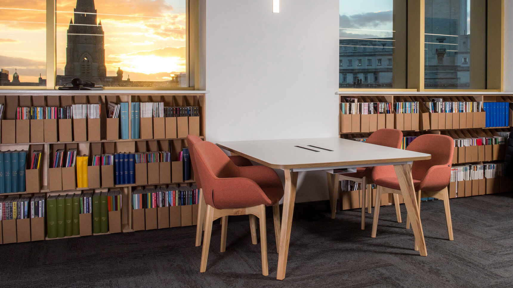 Elite Office Furniture Norden Meeting Chairs With Four Leg Base Wood Bases At Table In Office Setting