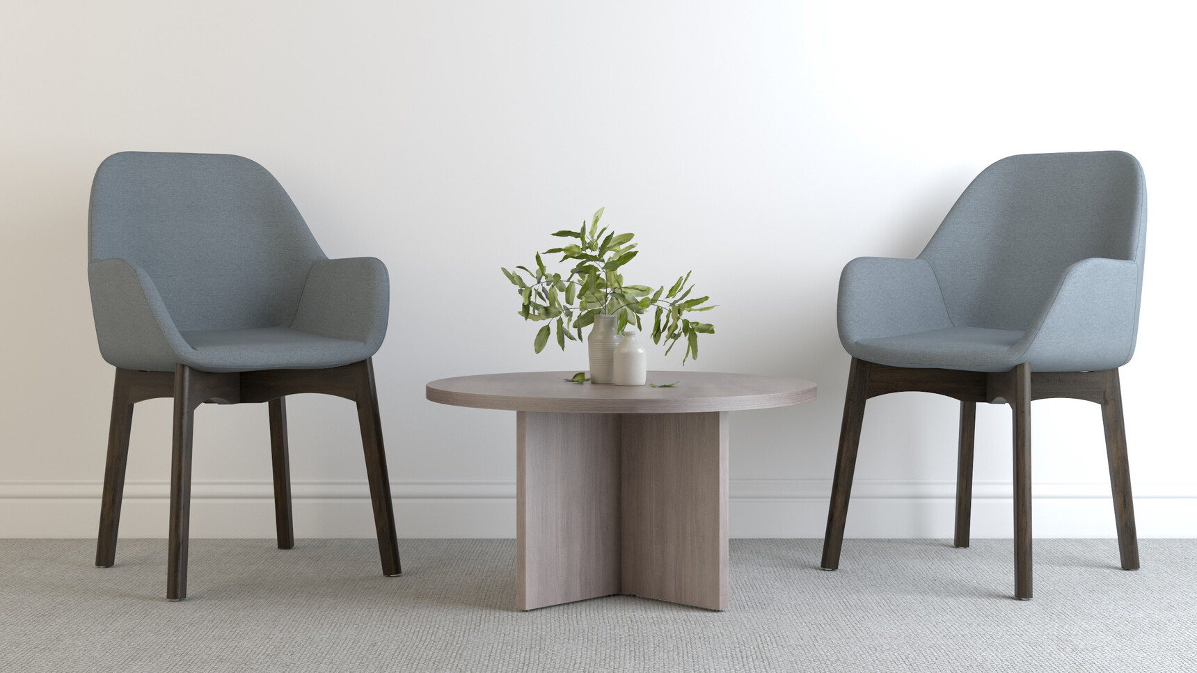 Two Elite Office Furniture Norden Meeting Chairs With Four Leg Bases At Coffee Table In Office Setting