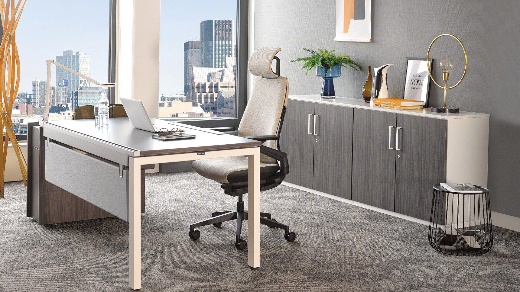 Steelcase Gesture Wrapped Back Office Chair with Headrest White Upholstery With Black Frame And Legs On Castors At Steelcase Desk