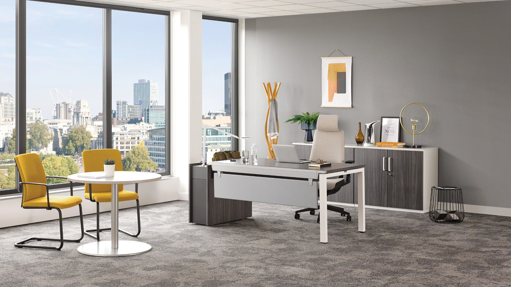 Steelcase Gesture Wrapped Back Office Chair with Headrest White Upholstery With Black Frame And Legs On Castors At Steelcase Desk In Office