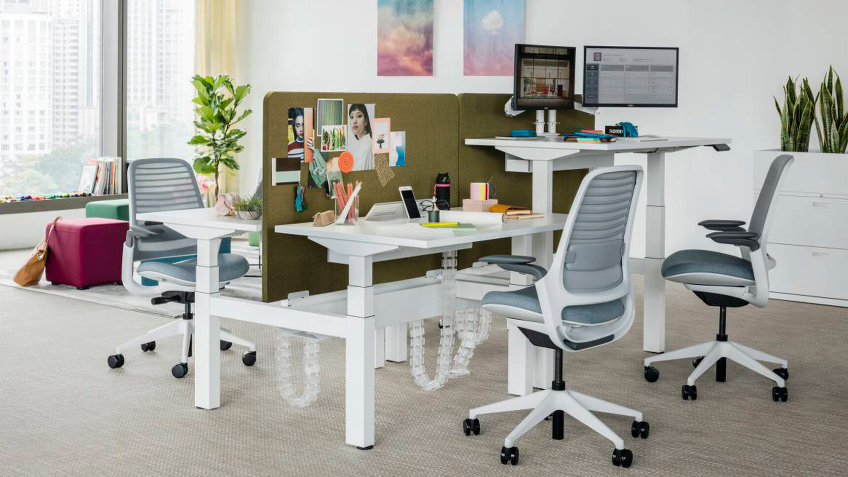 Two Steelcase Migration Height Adjustable Bench Desks With White Finish And Base With Four Series One Office Chairs In Blue Upholstery At Desks