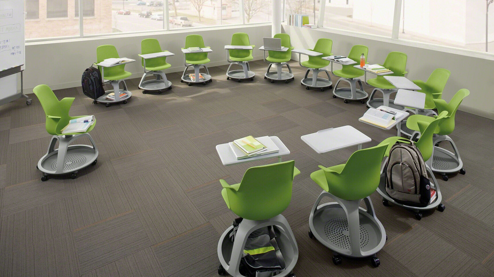 Fourteen Steelcase Node Tripod Base Chairs With Table On Castors With Green Finish In Educational Setting
