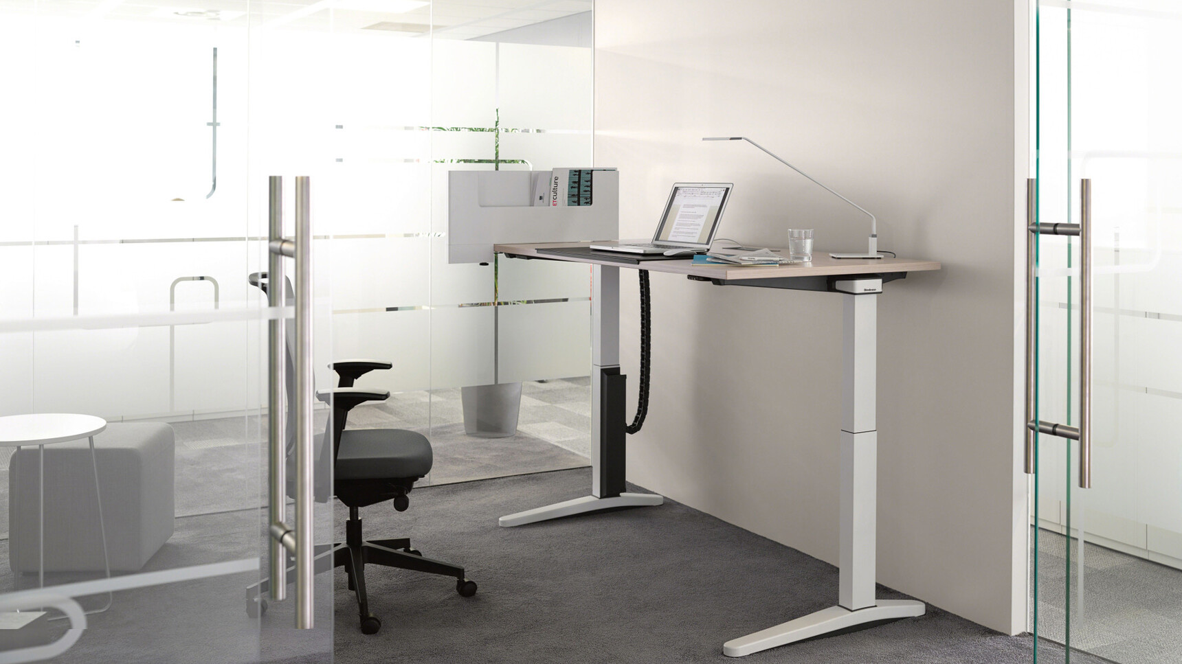 Steelcase Ology Height Adjustable Desks with Simple Touch With Grey Leg Finish And Light Wood Table Top Finish And Steelcase Office Chair With Dark Grey Upholstery