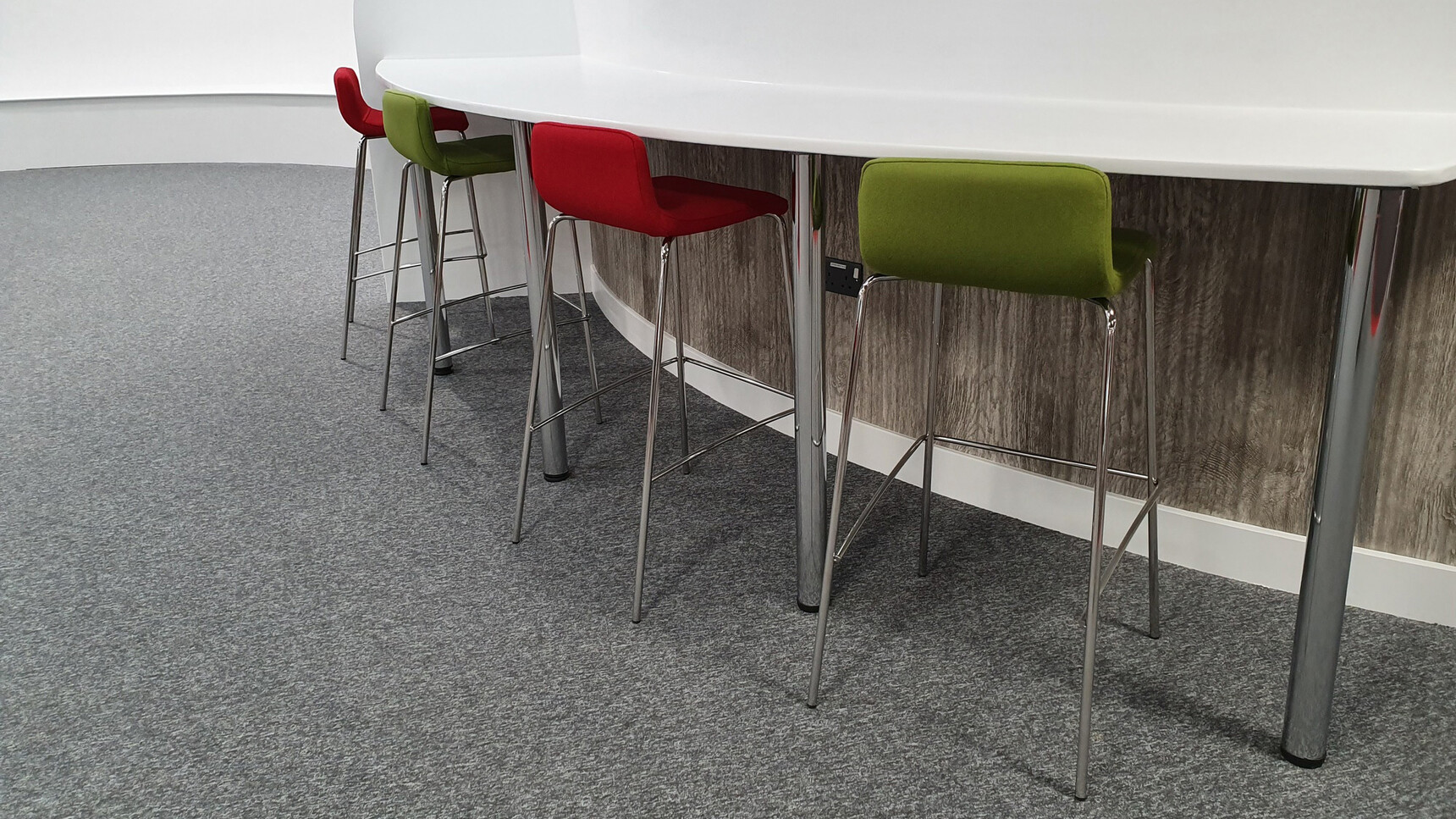 Elite Office Furniture Multiply Stools With Four Leg Base Fully Upholstered Green Red Upholstery Detail Image