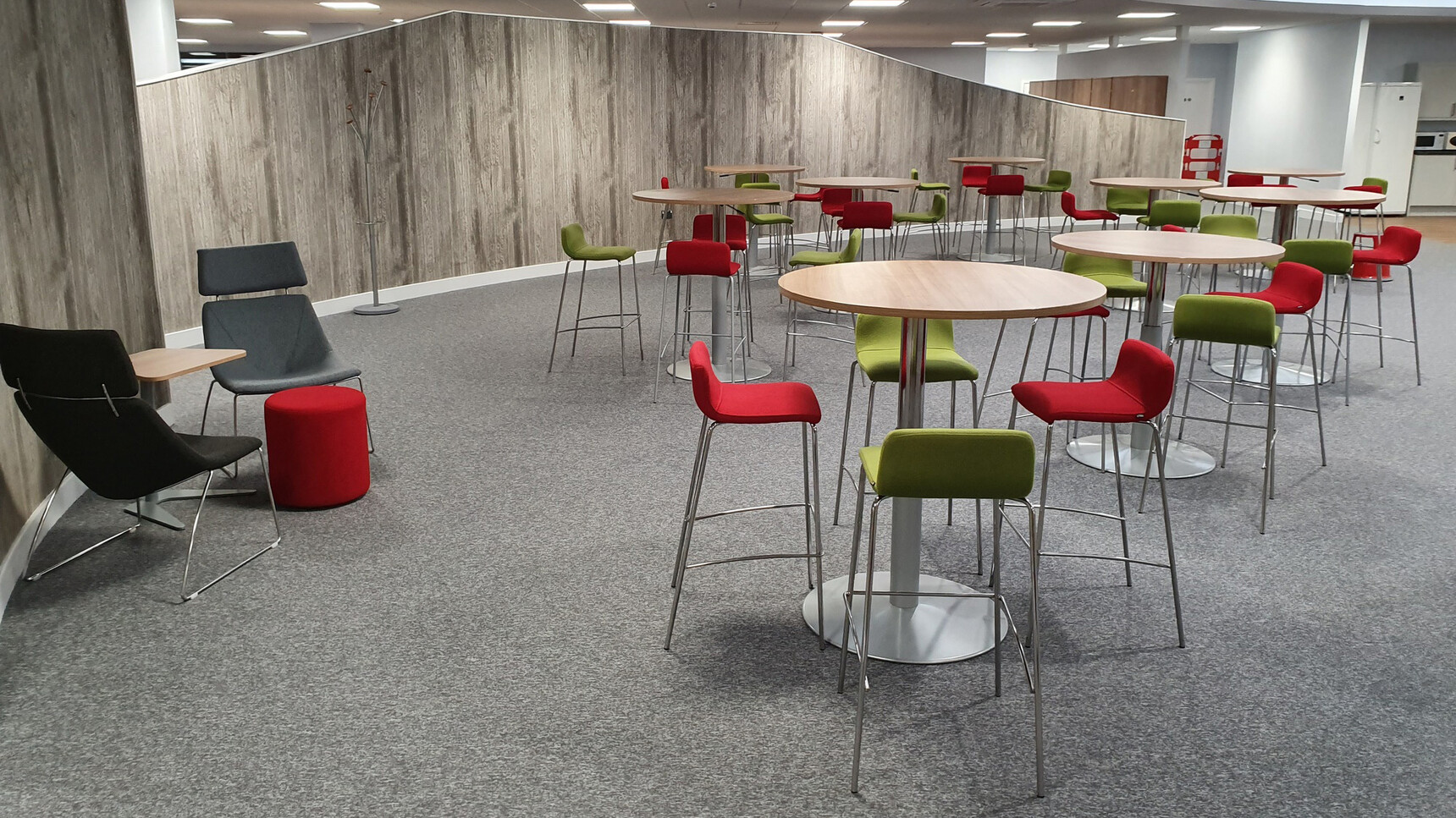 Elite Office Furniture Multiply Stools With Four Leg Base Fully Upholstered Green Red Upholstery In Office Setting