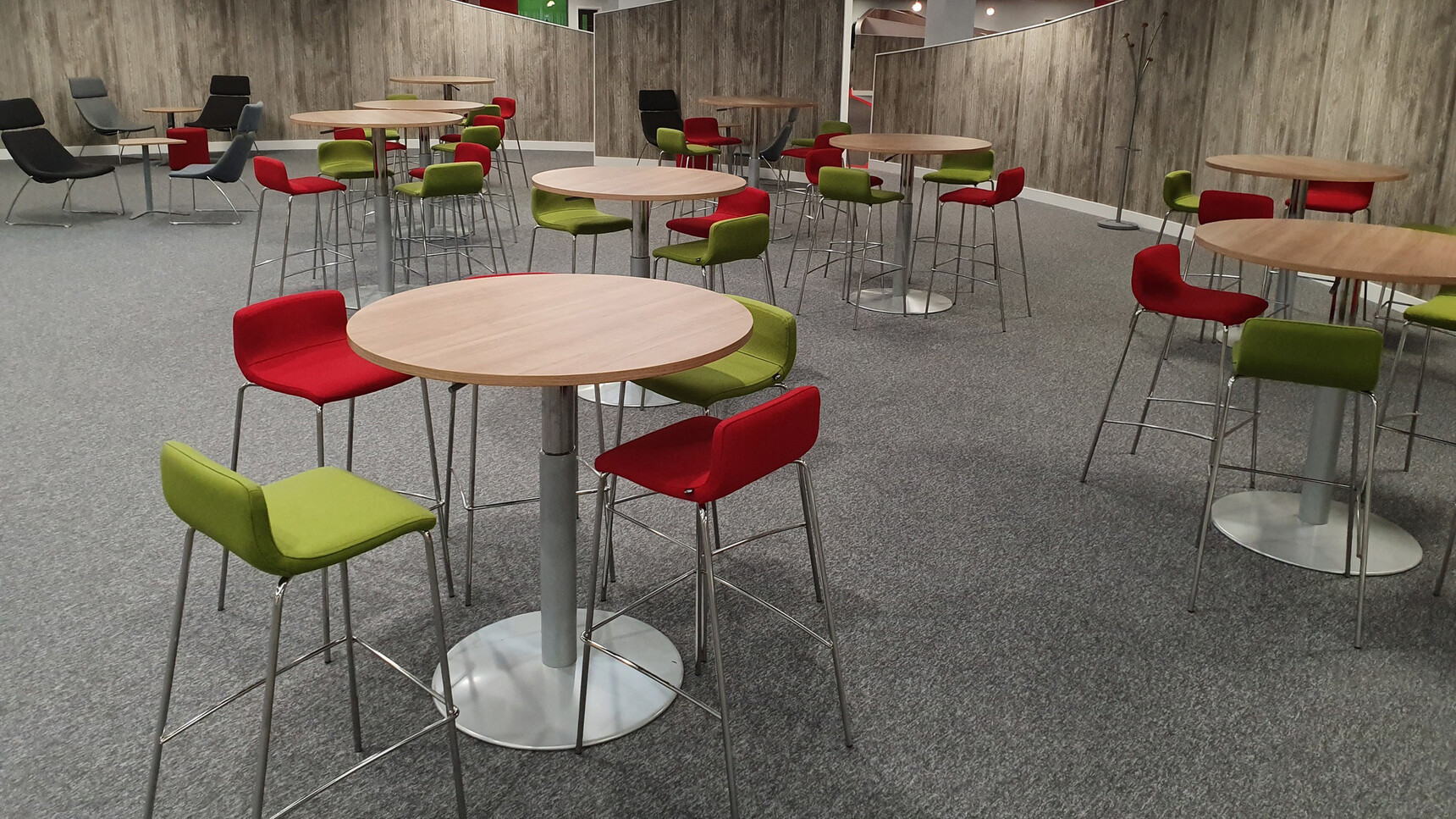 Elite Office Furniture Multiply Stools With Four Leg Base Fully Upholstered Green Red Upholstery In Office Environment