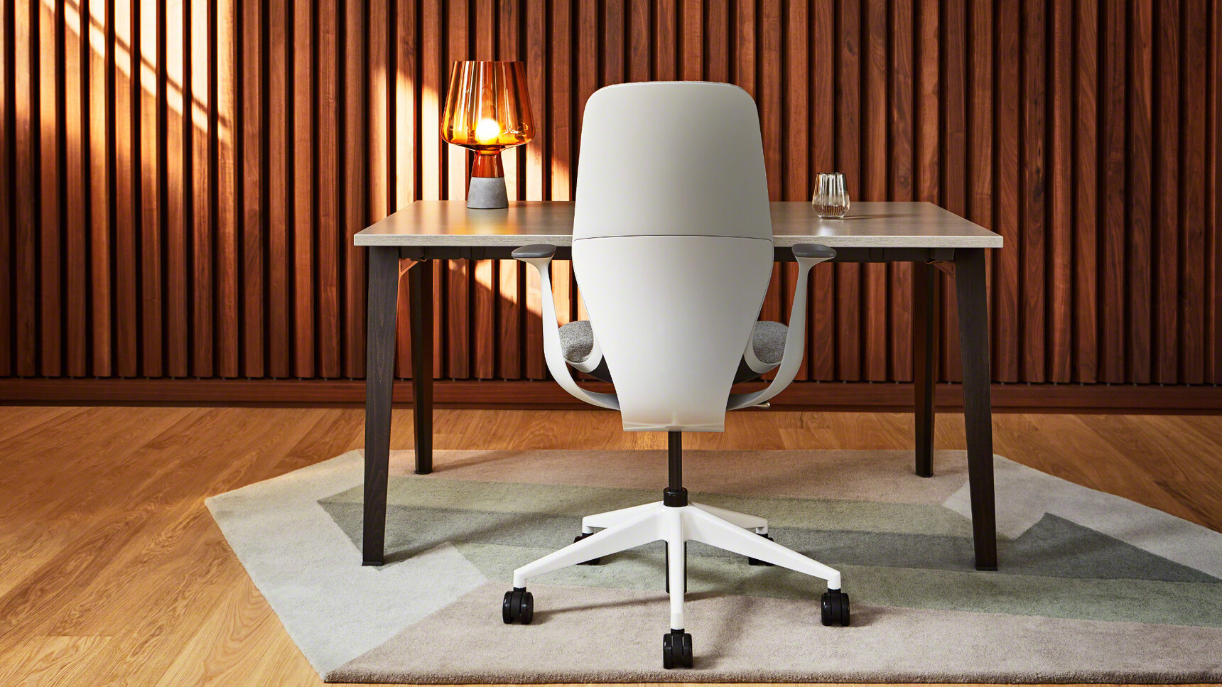 Steelcase SilQ Upholstered Office Chair With Light Grey Frame And White Base On Castors At Steelcase Desk