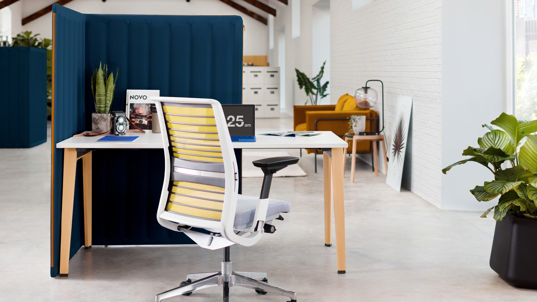 Steelcase Think 3D Knit Back Office Chair With Grey Upholstery And Yellow Backrest And White Frame And Polished Aluminium Base At B-Free Desk With White Table Top Finish And Wood Legs