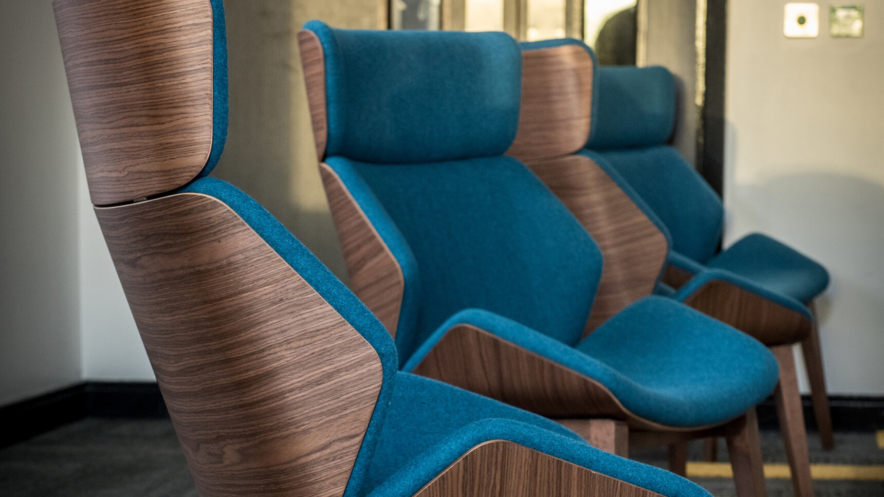 Elite Office Furniture Cascara High Back Lounge Chairs With Four Leg Base Walnut Frame Blue Upholstery Family Image