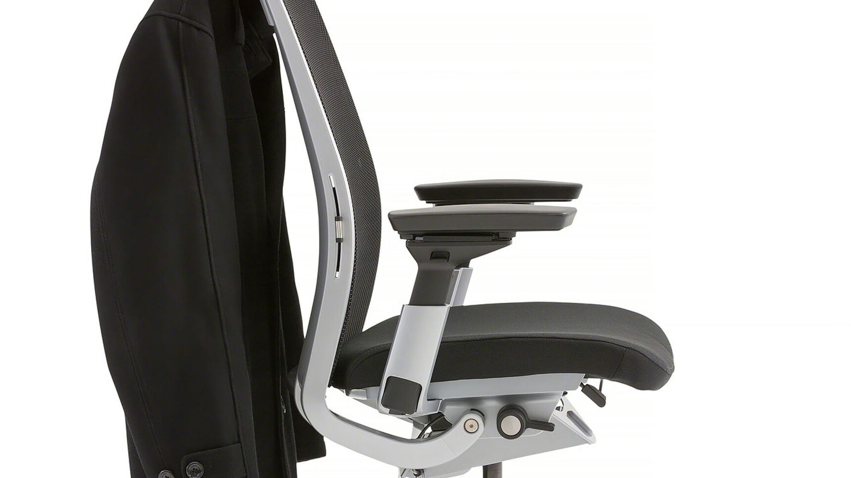 Steelcase Think Upholstered Office Chair With Black Backrest And Seat Upholstery And Grey Frame With Grey And Black Arms With Coat On Chair Detail Image