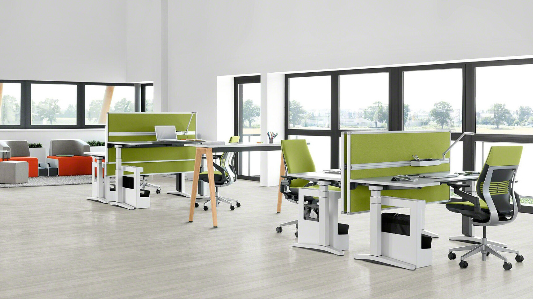 Four Gesture Wrapped Back Office Chairs With Green Upholstery With Black Grey Frame And Black Armrests And Grey Base On Castors At Four Height Adjustable Desks With Grey Table Top Finish And White Leg Finish