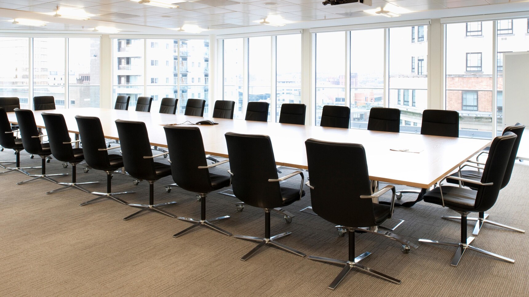 Orangebox Calder Highback Swivel Meeting Chairs Black Upholstery Polished Frame In Office Setting