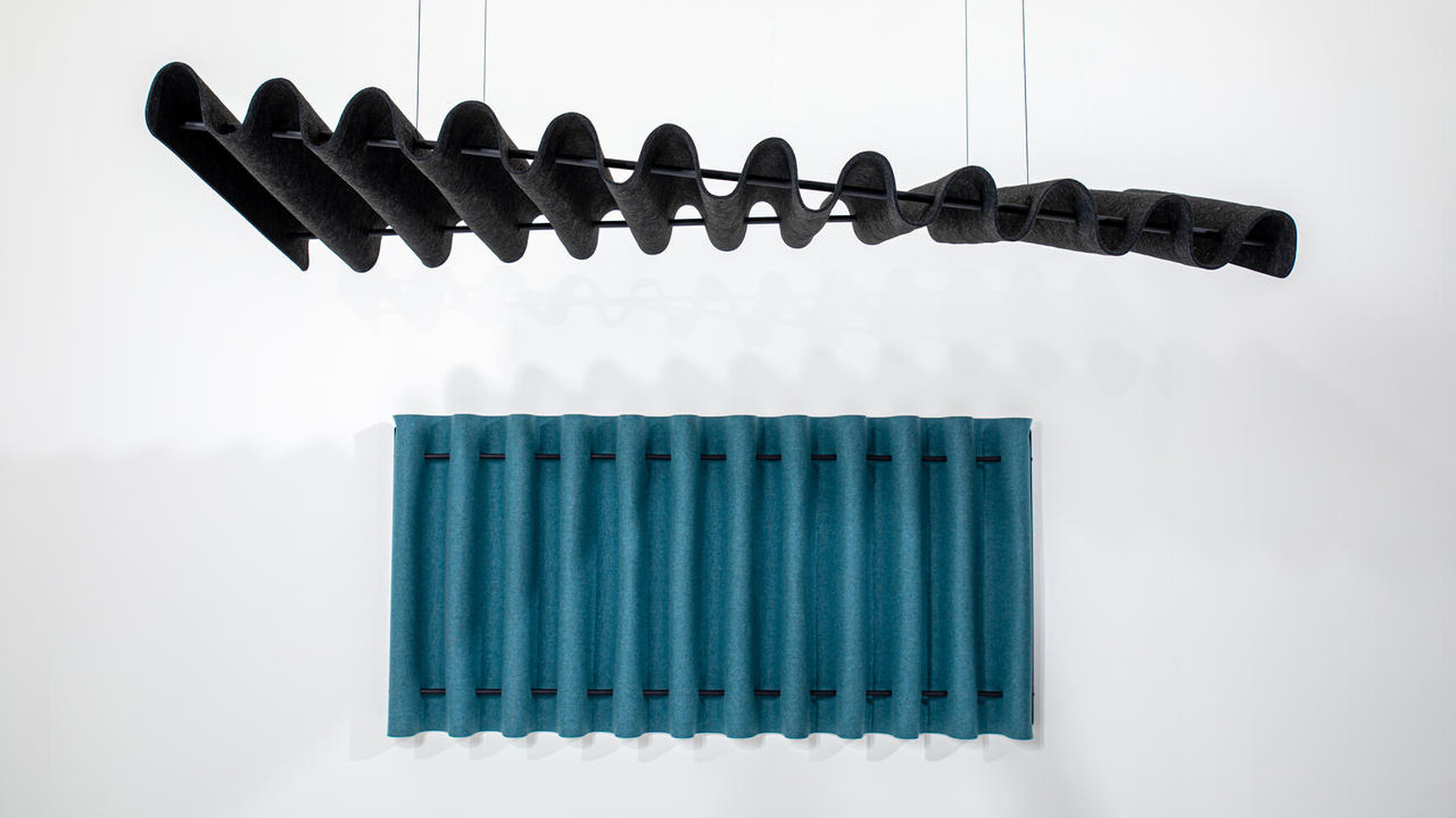 Buzzi Space BuzziFold Acoustic Element Wall Mounted And Ceiling Mounted Blue Upholstery Black Upholstery In Office Environment