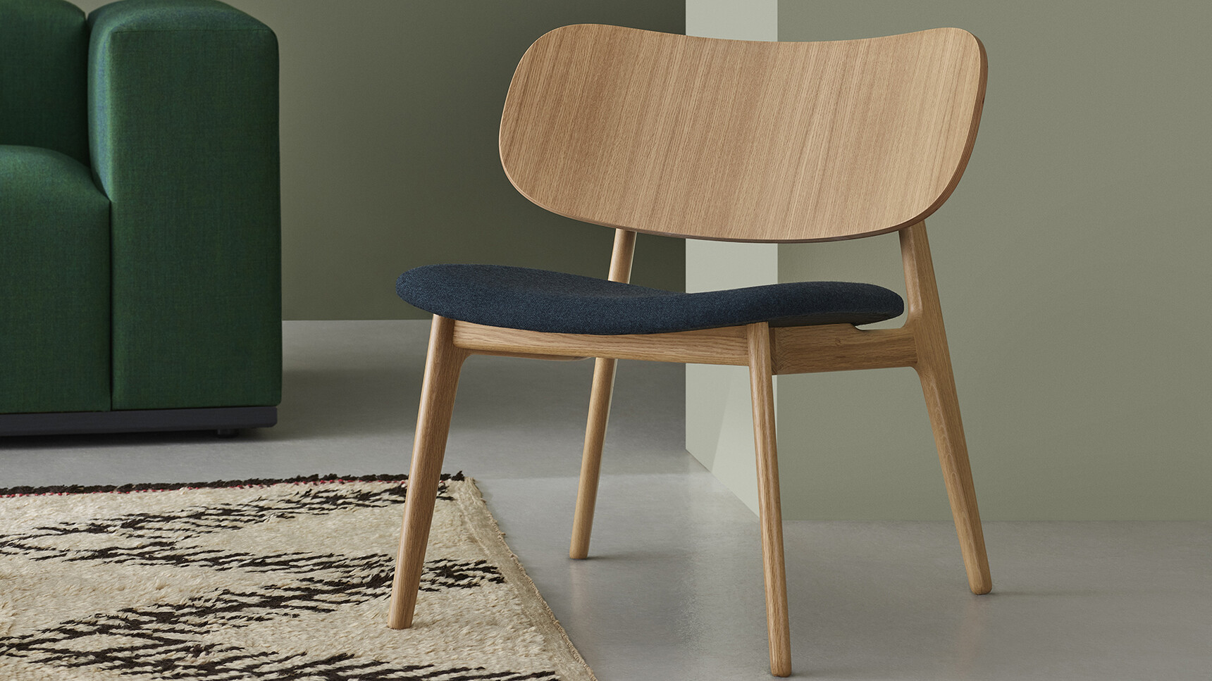 Modus PLC Lounge Chair Oak With Upholstered Seat In Lounge Area