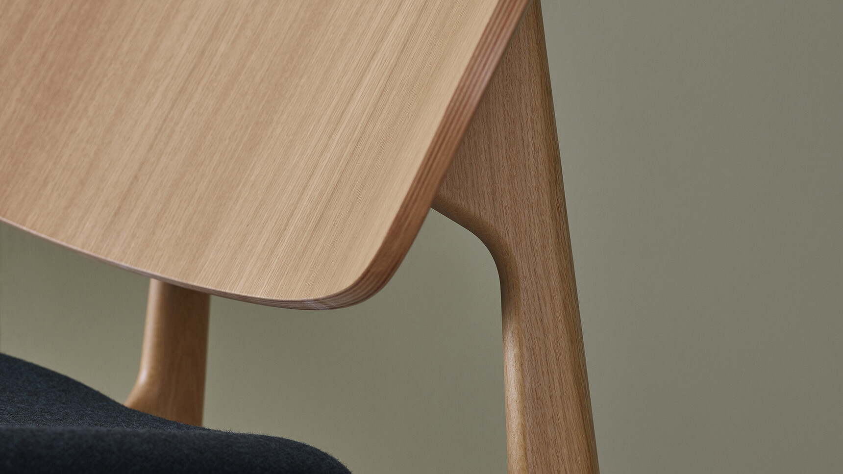 Modus PLC Lounge Chair Oak With Blue Upholstered Seat Detail Image
