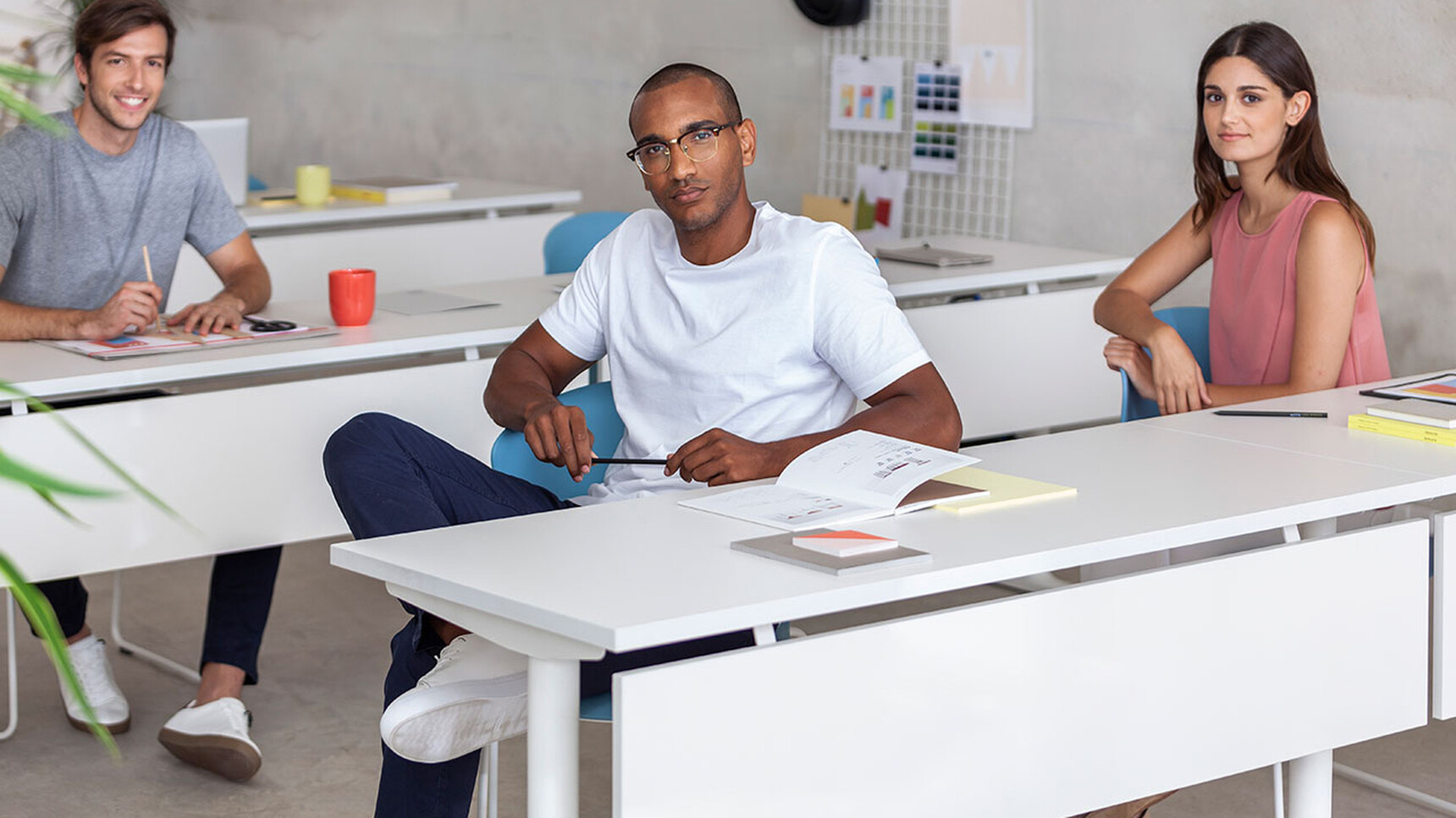 Actiu Talent Series 100 Rectangular Desk With Levelers Detail Image Of Three People