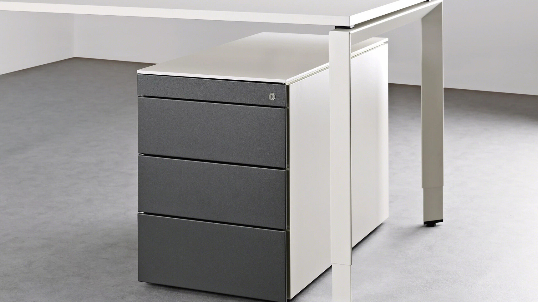 Steelcase Implicit Four Drawer Pedestal With Premium Front On Castors Steel Grey Finish Black Front Family Image