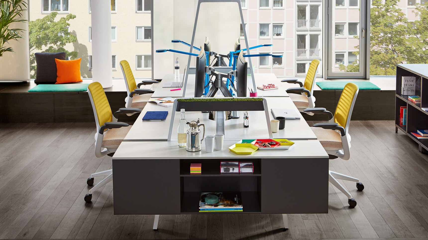 Four Steelcase Series One Office Task Chairs Insitu at Fixed Height Work Bench