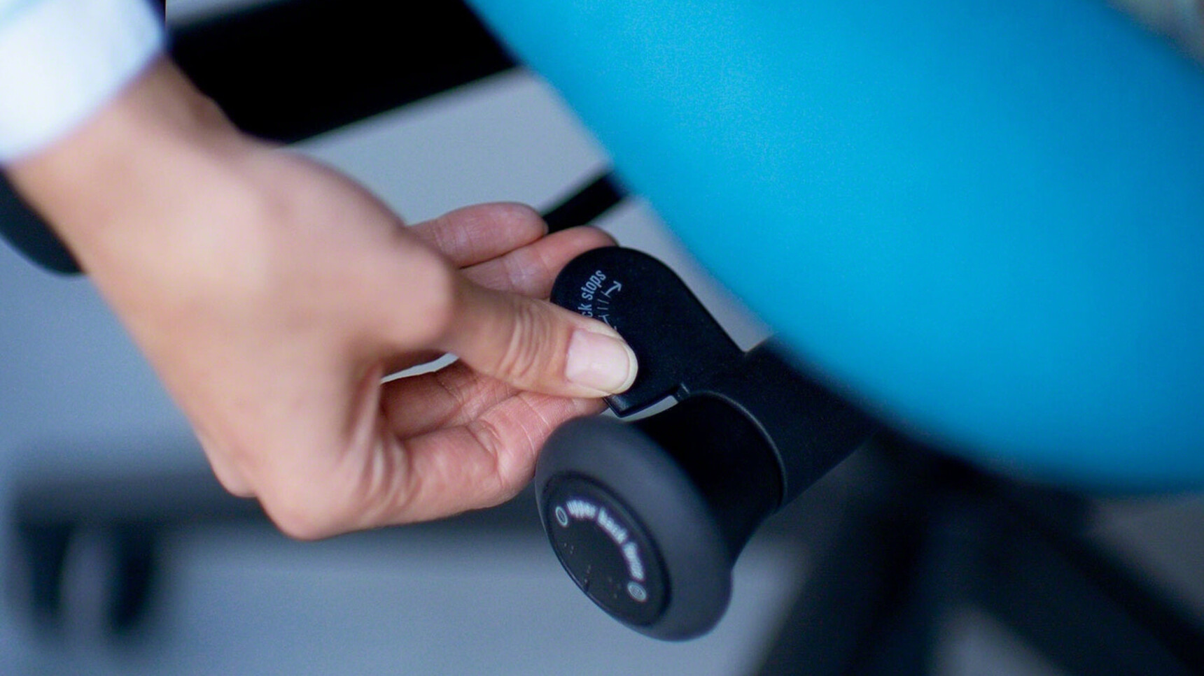 Steelcase Leap Upholstered Office Chair With Blue Upholstery Showing Back Support In Use With Close Up Shot