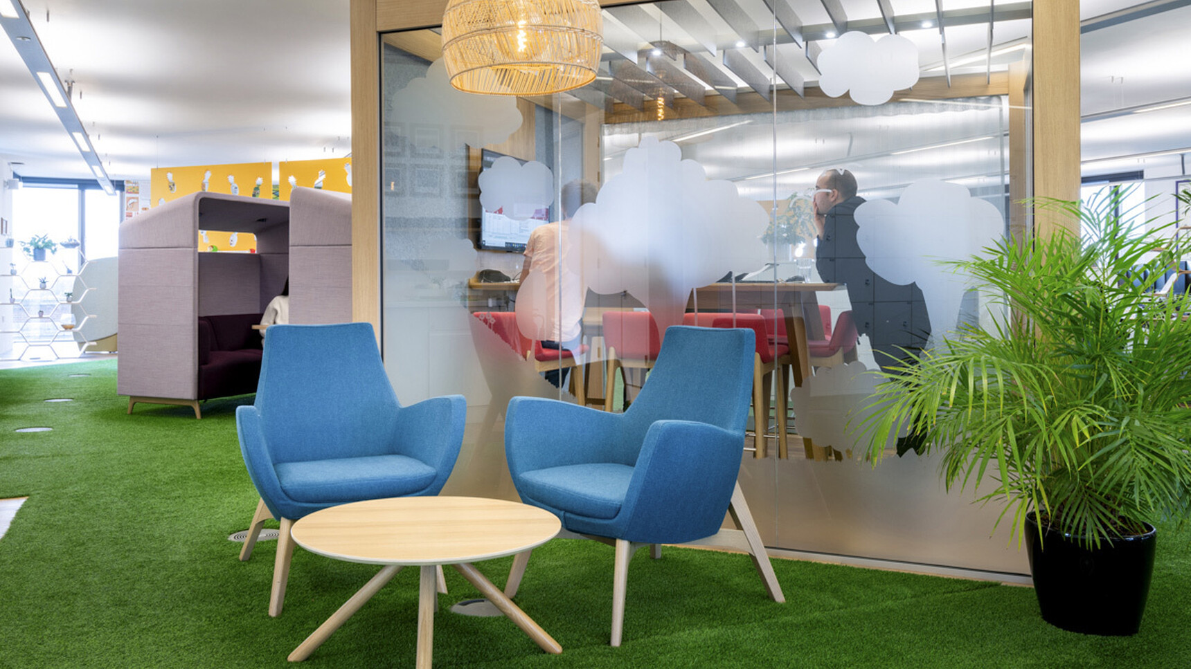 Connection Mae Medium Back Lounge Armchair With Four Leg Base In Office Setting