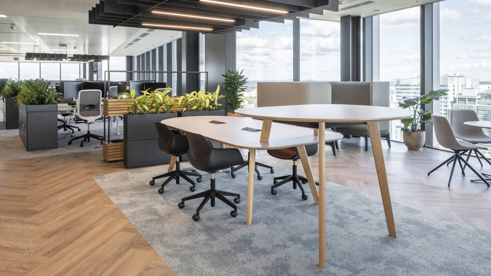 Connection Co. Table Poseur Height Table Oak Finish In Office Setting