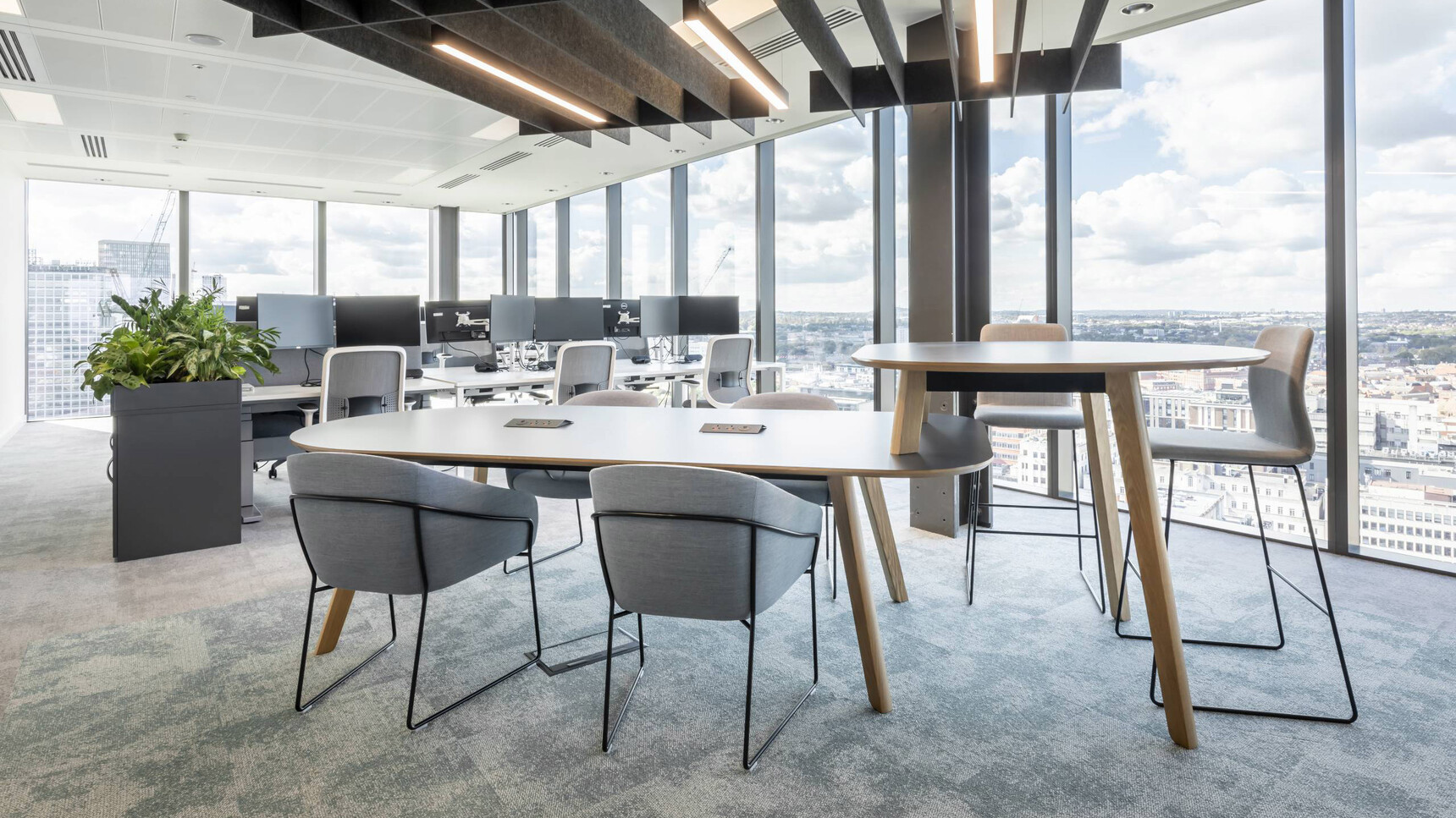 Connection Co. Table Poseur Height Table With Chairs At Table In Office Environment