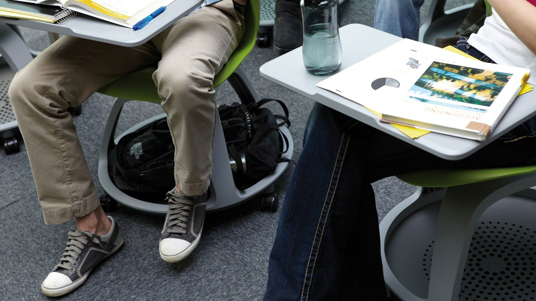 Five Steelcase Node Tripod Base Chair With Table And Castors With Plastic Back And Seat In Green And Near Black Base Close Up Image