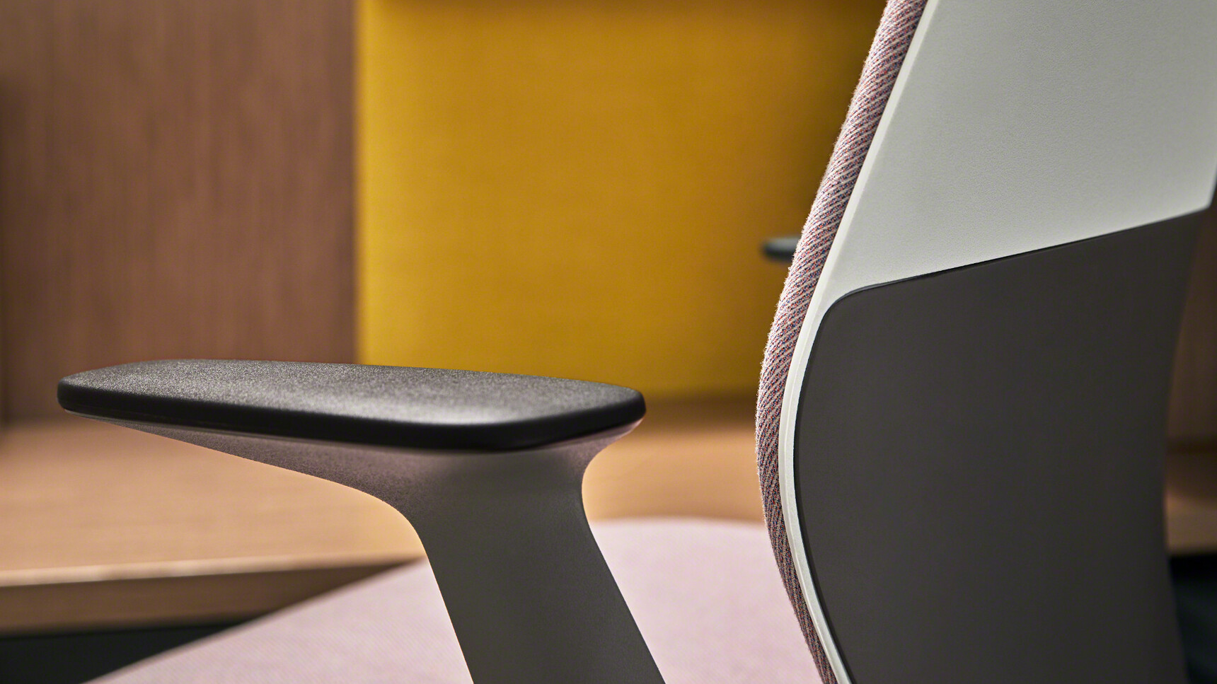 Steelcase SilQ Upholstered Office Chair With Pink Upholstery And Black Light Grey Frame And Black Grey Fixed Arms Close Up Detail Shot