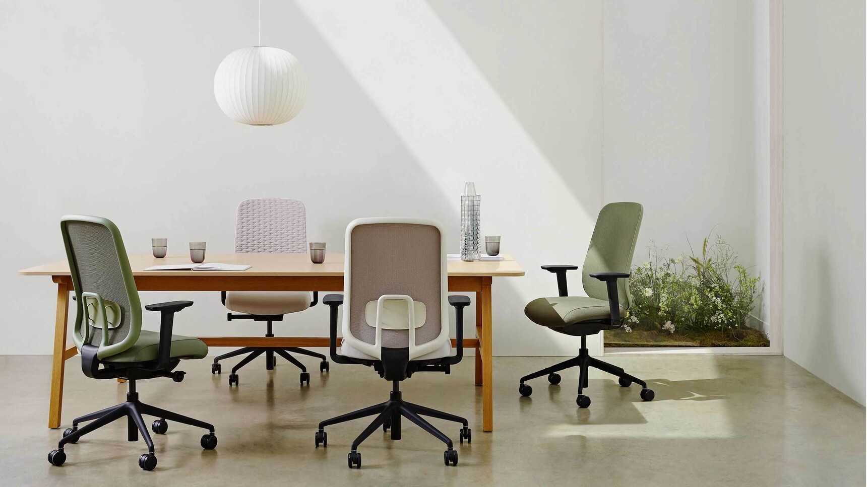 Boss Design Sia Mesh Back Office Chairs At Table In Office Setting