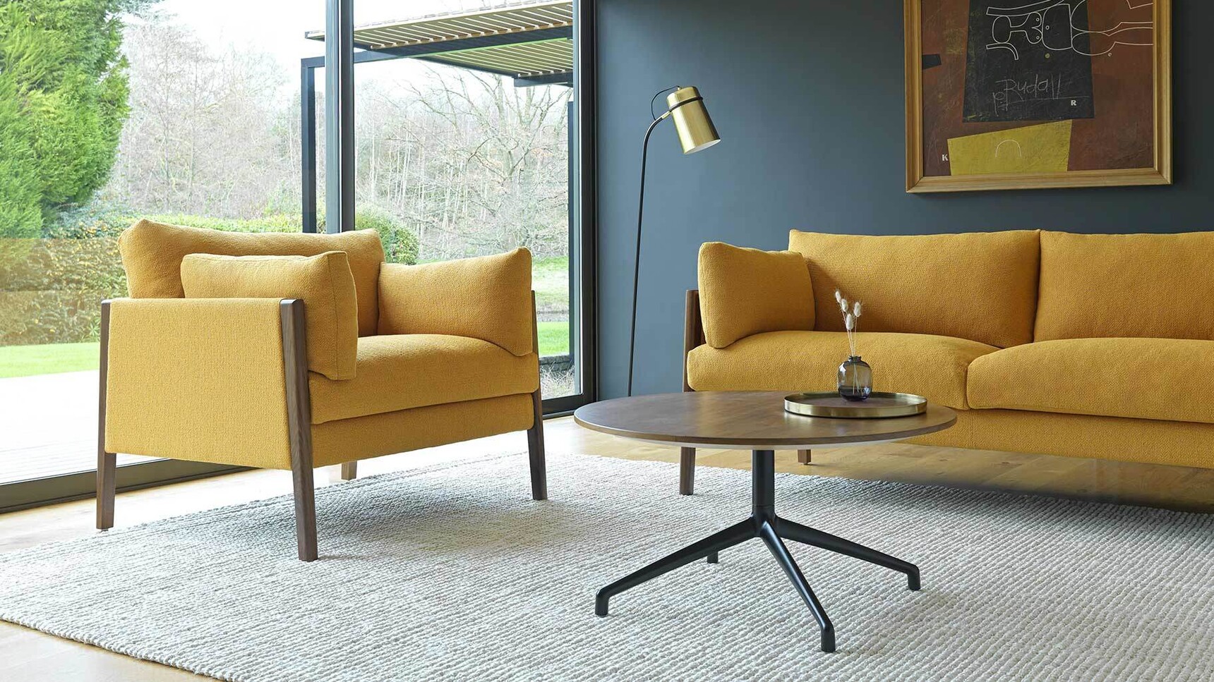 Boss Design Armchair And Sofa In Lounge Setting