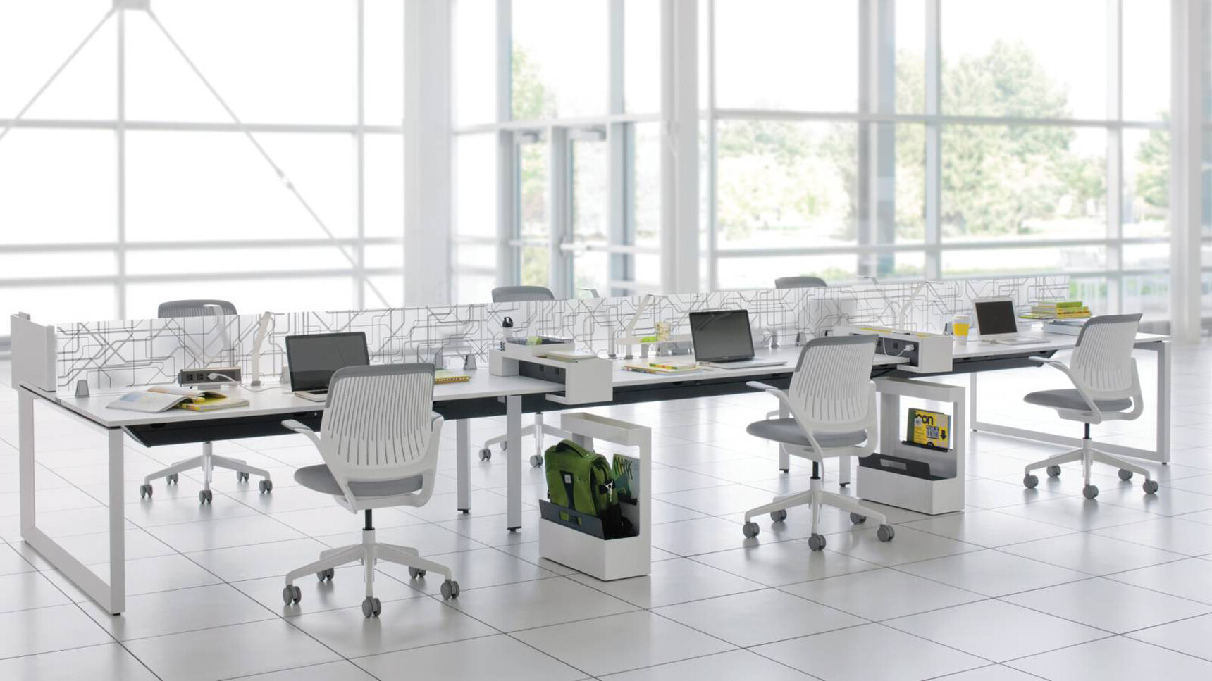 Steelcase Frameone Loop Leg Bench Desk With White Table Top Finish With Grey Leg Finish With Six Cobi Office Chairs With Grey Upholstery ANd White Frame And Grey Leg Finish At Desk