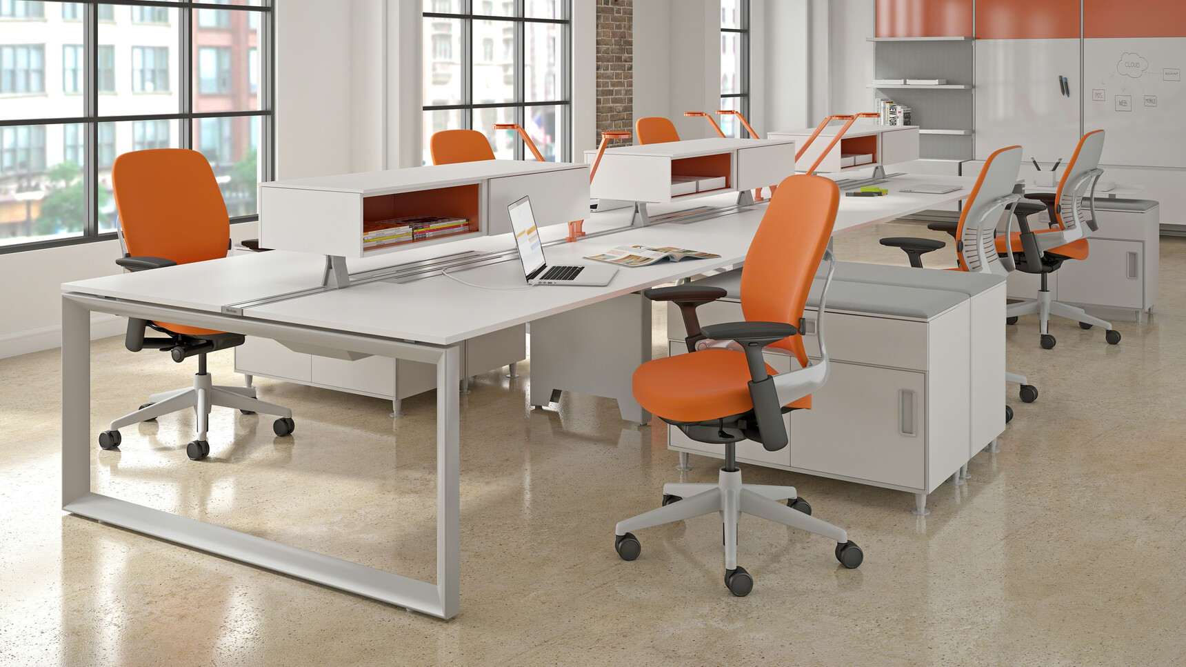 Steelcase Frameone Loop Leg Bench Desk With White Table Top Finish And Grey Metal Leg With Six Leap Upholstered Office Chairs With Orange Upholstery And Grey Frame And Leg Finish On Castors