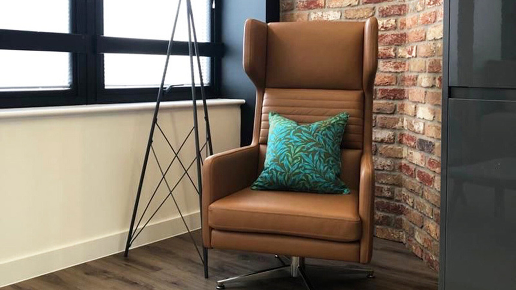 OB&B Hydde Swivel Chair In Lounge Setting