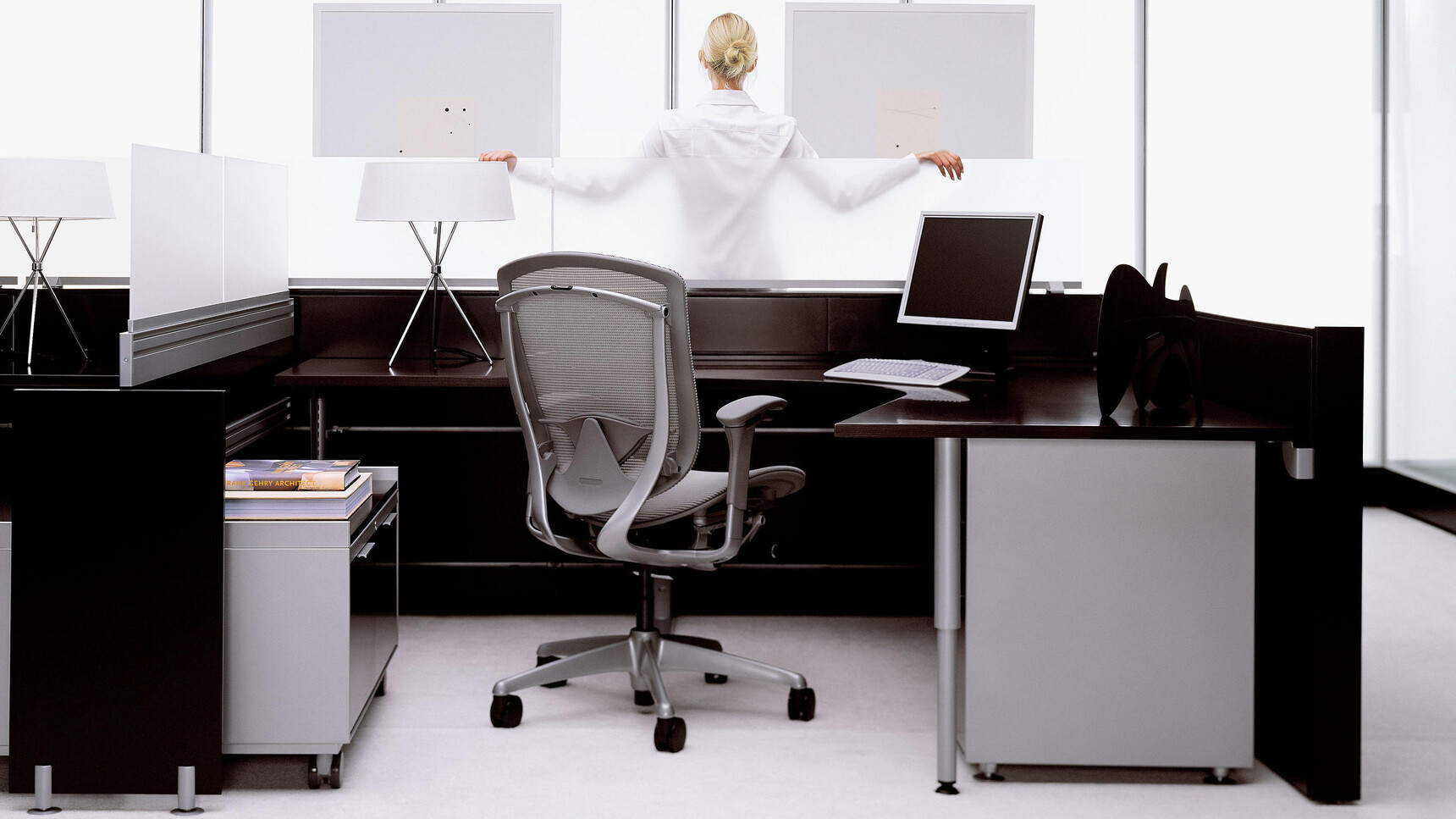 Okamura Contessa II Mesh Seat & Back Office Chair With Grey Cushion And Backrest With Silver Frame Finish And Grey 4-D Adjustable Arms With Grey Base Finish On Castors At Desk