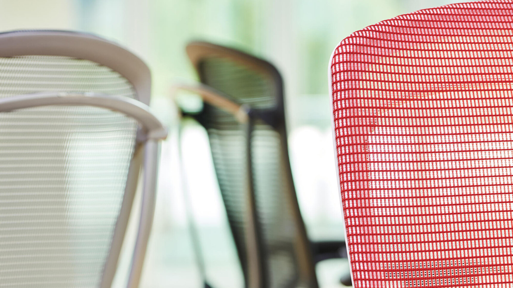 Three Okamura Contessa II Mesh Seat & Back Office Chairs One WIth Red Backrest One With White And One With Green Upholstery Two With White Frame One With Black Detail Image