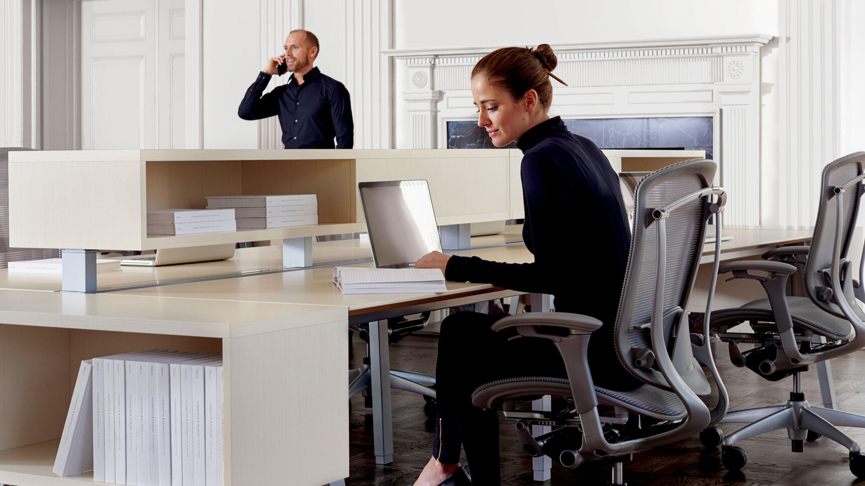 Two Okamura Contessa II Mesh Seat & Back Office Chair Grey Finish Grey 4-D Adjustable Arms At Desks In Use